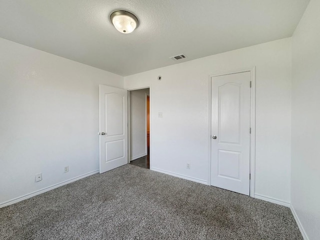 303 Rowdy Dr, Killeen, TX 76542 - unfurnished bedroom featuring carpet flooring