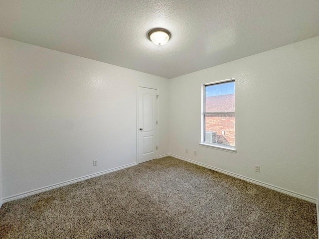 303 Rowdy Dr, Killeen, TX 76542 - empty room featuring carpet and a textured ceiling
