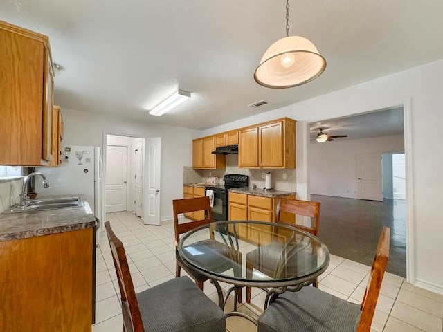 303 Rowdy Dr, Killeen, TX 76542 - dining area with light tile patterned flooring and a ceiling fan
