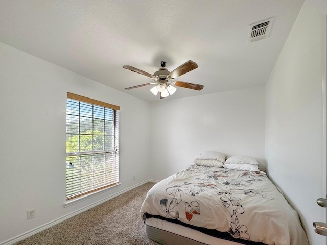 303 Rowdy Dr, Killeen, TX 76542 - carpeted bedroom featuring baseboards and ceiling fan