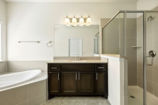 8821 Cattle Baron Path, Austin, TX 78747 - full bathroom featuring vanity, a stall shower, and a bath