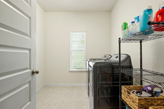 8821 Cattle Baron Path, Austin, TX 78747 - laundry room featuring independent washer and dryer and baseboards