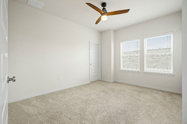 8821 Cattle Baron Path, Austin, TX 78747 - unfurnished room with light carpet and a ceiling fan