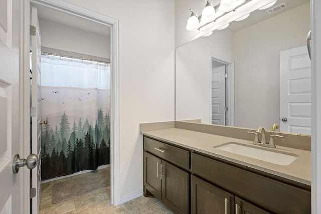 8821 Cattle Baron Path, Austin, TX 78747 - full bathroom with vanity, a chandelier, and curtained shower