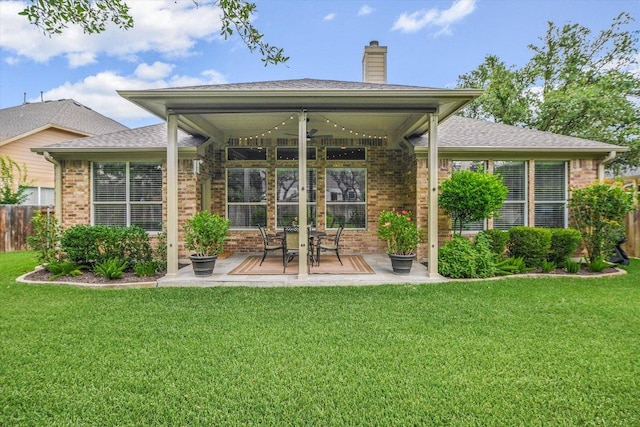 10320 Hansa Cv, Austin, TX 78739 - rear view of property with brick siding, a ceiling fan, a patio area, a chimney, and roof with shingles