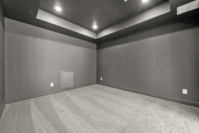 401 Golden Sage Ave, Georgetown, TX 78633 - carpeted empty room featuring a tray ceiling and recessed lighting