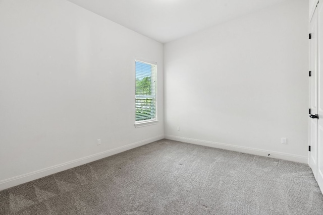 377 Bristlecone Dr, Driftwood, TX 78619 - carpeted spare room with baseboards