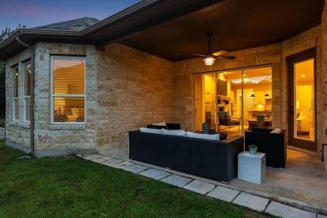 377 Bristlecone Dr, Driftwood, TX 78619 - patio terrace at dusk with an outdoor living space, a ceiling fan, and a patio