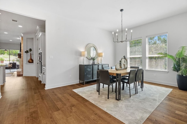 377 Bristlecone Dr, Driftwood, TX 78619 - dining room featuring a chandelier, dark wood finished floors, and recessed lighting