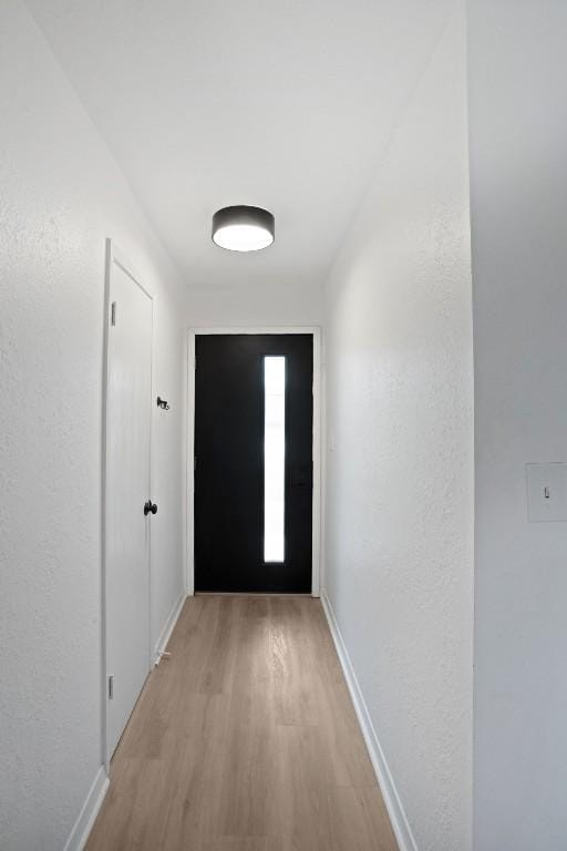 1004 Scenic Dr, Georgetown, TX 78626 - entryway featuring light wood-type flooring and a textured wall