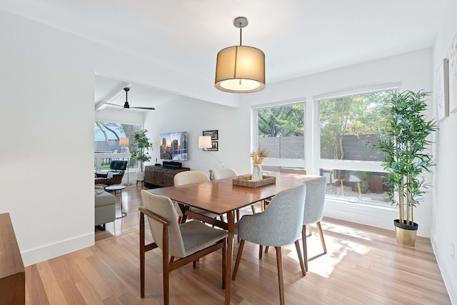 4405 Greystone Dr, Austin, TX 78731 - dining room featuring light wood-style flooring, lofted ceiling, and ceiling fan