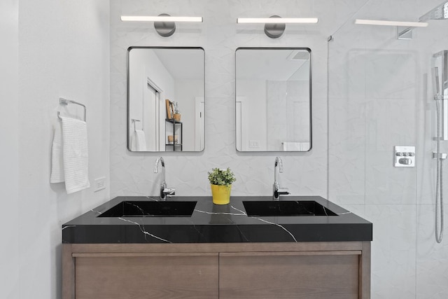 4405 Greystone Dr, Austin, TX 78731 - full bath with double vanity, tasteful backsplash, and a shower