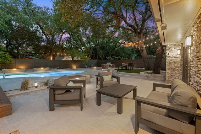 4405 Greystone Dr, Austin, TX 78731 - pool at dusk featuring an outdoor hangout area, a fenced backyard, and a patio