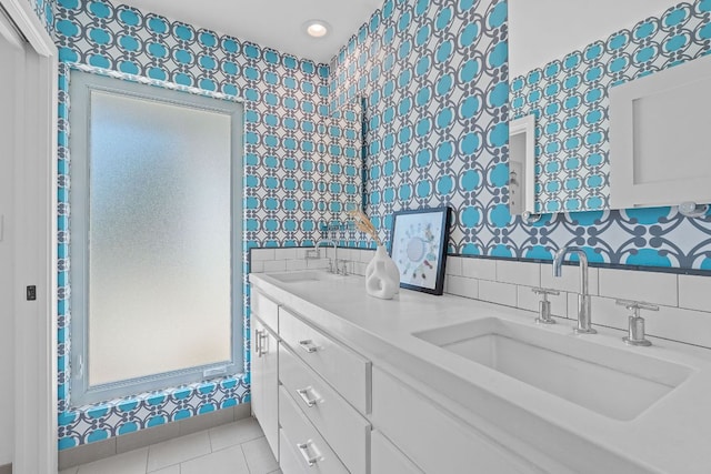 4405 Greystone Dr, Austin, TX 78731 - bathroom with tile patterned flooring, double vanity, recessed lighting, and tasteful backsplash