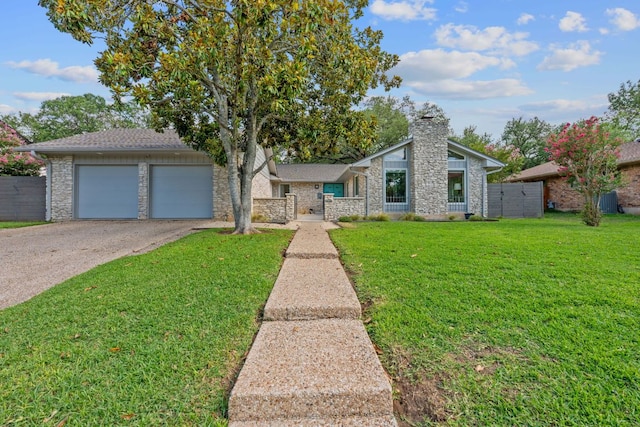 4405 Greystone Dr, Austin, TX 78731 - mid-century home with asphalt driveway, stone siding, and a chimney