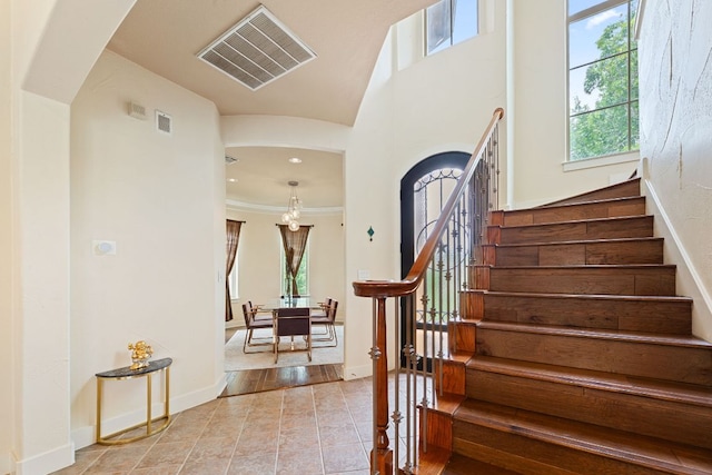 2800 Waymaker Way Unit 63, Austin, TX 78746 - staircase featuring tile patterned flooring, plenty of natural light, and recessed lighting
