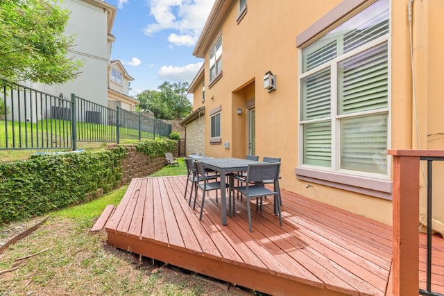 2800 Waymaker Way Unit 63, Austin, TX 78746 - deck with outdoor dining space and a fenced backyard
