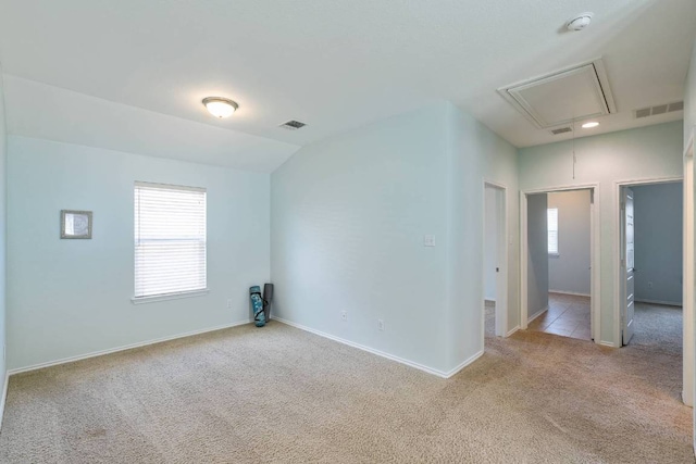 404 Buttercup Creek Blvd Unit 19, Cedar Park, TX 78613 - unfurnished room featuring attic access, carpet floors, and lofted ceiling