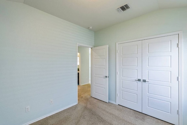 404 Buttercup Creek Blvd Unit 19, Cedar Park, TX 78613 - unfurnished bedroom with carpet floors, lofted ceiling, and a closet