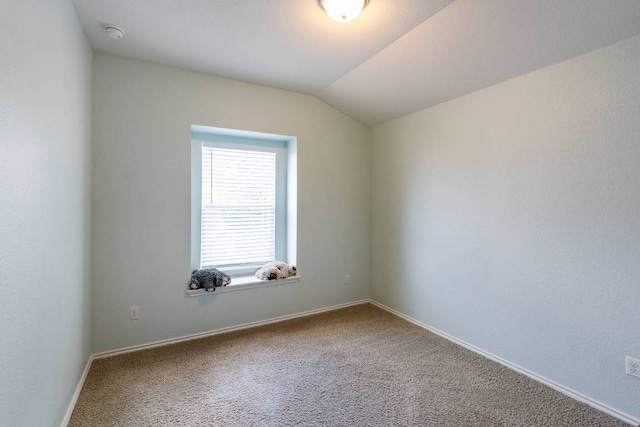 404 Buttercup Creek Blvd Unit 19, Cedar Park, TX 78613 - carpeted empty room featuring vaulted ceiling and baseboards
