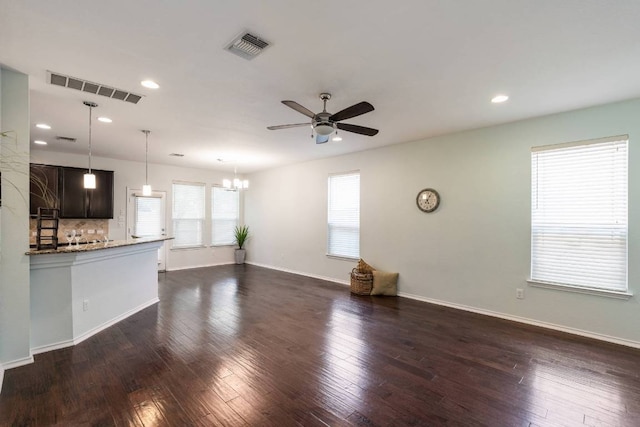 404 Buttercup Creek Blvd Unit 19, Cedar Park, TX 78613 - unfurnished living room with ceiling fan, recessed lighting, dark wood finished floors, and a chandelier
