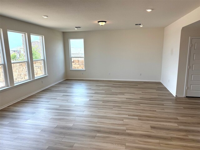 4805 Mozzafiato Ln, Round Rock, TX 78665 - unfurnished room with light wood-type flooring and recessed lighting