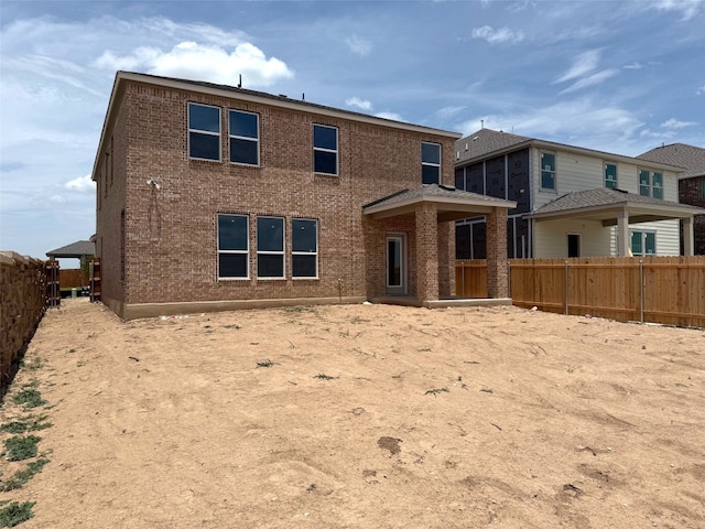 4805 Mozzafiato Ln, Round Rock, TX 78665 - back of property featuring brick siding