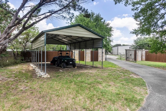 4910 Owen Ln, Temple, TX 76502 - view of vehicle parking with driveway and a carport