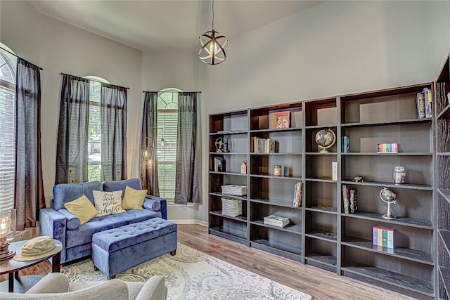 2712 Kickapoo Cavern Dr, Pflugerville, TX 78660 - sitting room featuring wood finished floors and baseboards