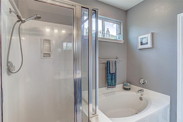 2712 Kickapoo Cavern Dr, Pflugerville, TX 78660 - bathroom featuring a stall shower and a bath