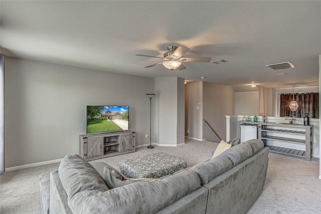 2712 Kickapoo Cavern Dr, Pflugerville, TX 78660 - living area featuring carpet and a ceiling fan