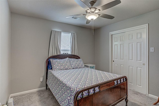 2712 Kickapoo Cavern Dr, Pflugerville, TX 78660 - carpeted bedroom featuring a closet and a ceiling fan