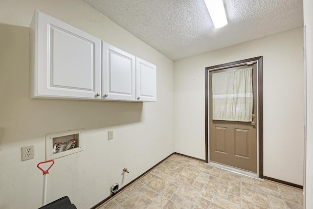 6606 Lancret Hill Dr, Austin, TX 78745 - laundry area featuring washer hookup, cabinet space, a textured ceiling, and gas dryer hookup