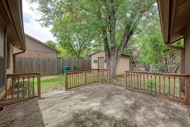 6606 Lancret Hill Dr, Austin, TX 78745 - fenced backyard with a patio area and an outbuilding