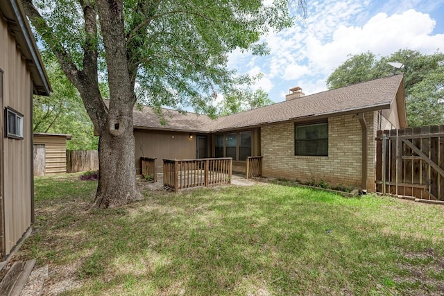 6606 Lancret Hill Dr, Austin, TX 78745 - rear view of property featuring brick siding, a chimney, and roof with shingles