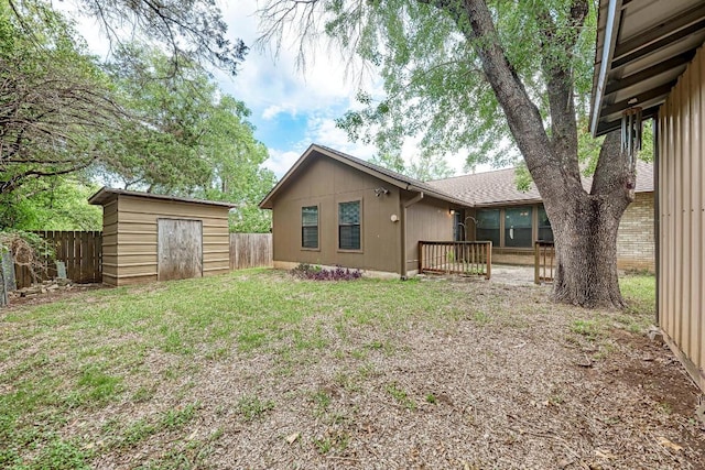6606 Lancret Hill Dr, Austin, TX 78745 - back of house with a storage unit and a fenced backyard