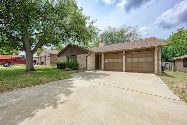 6606 Lancret Hill Dr, Austin, TX 78745 - view of front of property featuring an attached garage, brick siding, concrete driveway, and a chimney