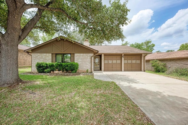 6606 Lancret Hill Dr, Austin, TX 78745 - view of front of property with a garage, concrete driveway, a chimney, brick siding, and a front lawn
