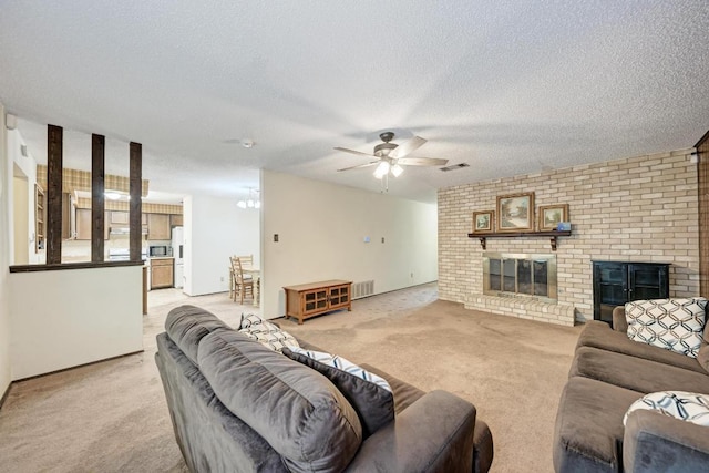 6606 Lancret Hill Dr, Austin, TX 78745 - living room with a ceiling fan, a fireplace, light carpet, and a textured ceiling
