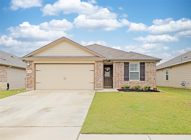 114 Creek Hollow Dr, Hutto, TX 78634 - single story home featuring brick siding, an attached garage, driveway, and a front yard