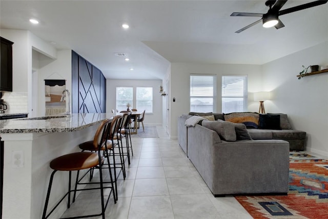 114 Creek Hollow Dr, Hutto, TX 78634 - living area with ceiling fan, light tile patterned flooring, and recessed lighting