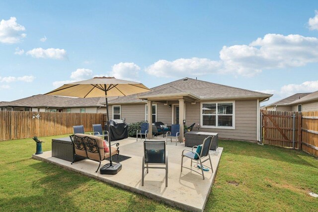 111 Krause Springs Dr, Hutto, TX 78634 - back of house featuring an outdoor living space, a fenced backyard, and a patio