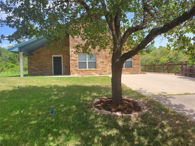 236 Makaha Dr, Bastrop, TX 78602 - view of front facade featuring stone siding