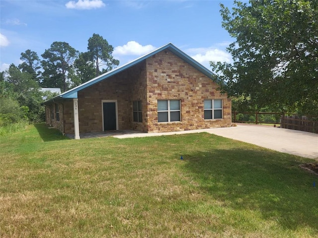 236 Makaha Dr, Bastrop, TX 78602 - rear view of house with a patio