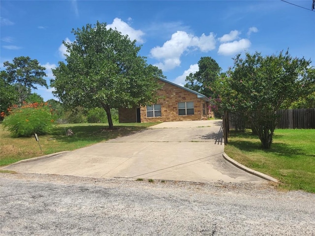 236 Makaha Dr, Bastrop, TX 78602 - view of front of home featuring concrete driveway