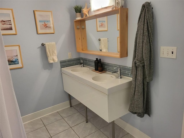 236 Makaha Dr, Bastrop, TX 78602 - bathroom featuring tile patterned flooring and double vanity