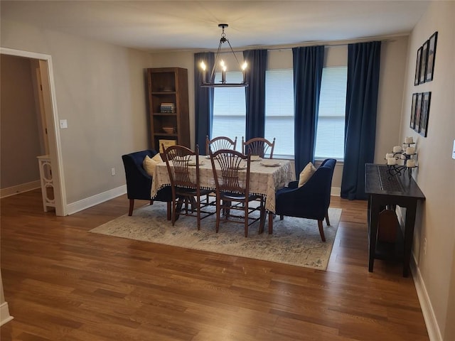 236 Makaha Dr, Bastrop, TX 78602 - dining space with wood finished floors and a chandelier