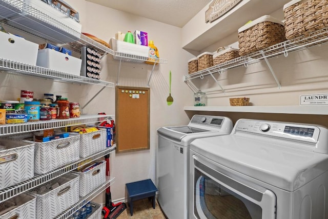1111 Whitley Dr, Leander, TX 78641 - laundry area featuring separate washer and dryer and light tile patterned flooring