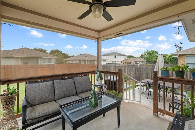 1111 Whitley Dr, Leander, TX 78641 - fenced backyard with outdoor lounge area, outdoor dining space, a ceiling fan, and a patio