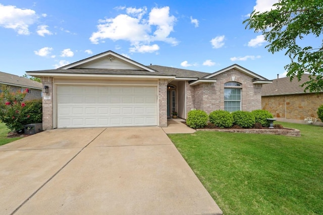 1111 Whitley Dr, Leander, TX 78641 - ranch-style home featuring concrete driveway, brick siding, a front yard, a garage, and a shingled roof